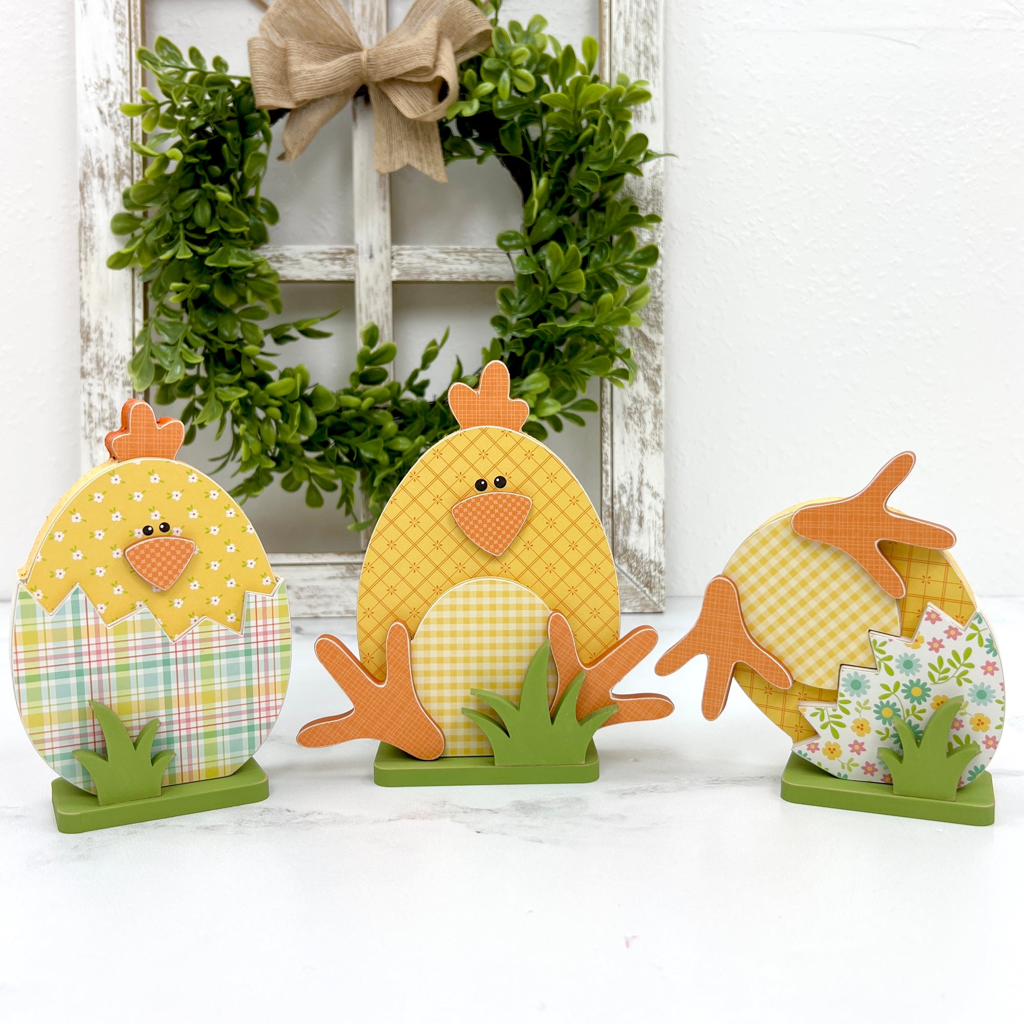 three yellow chicks sitting in cracked easter eggs wood craft decor
