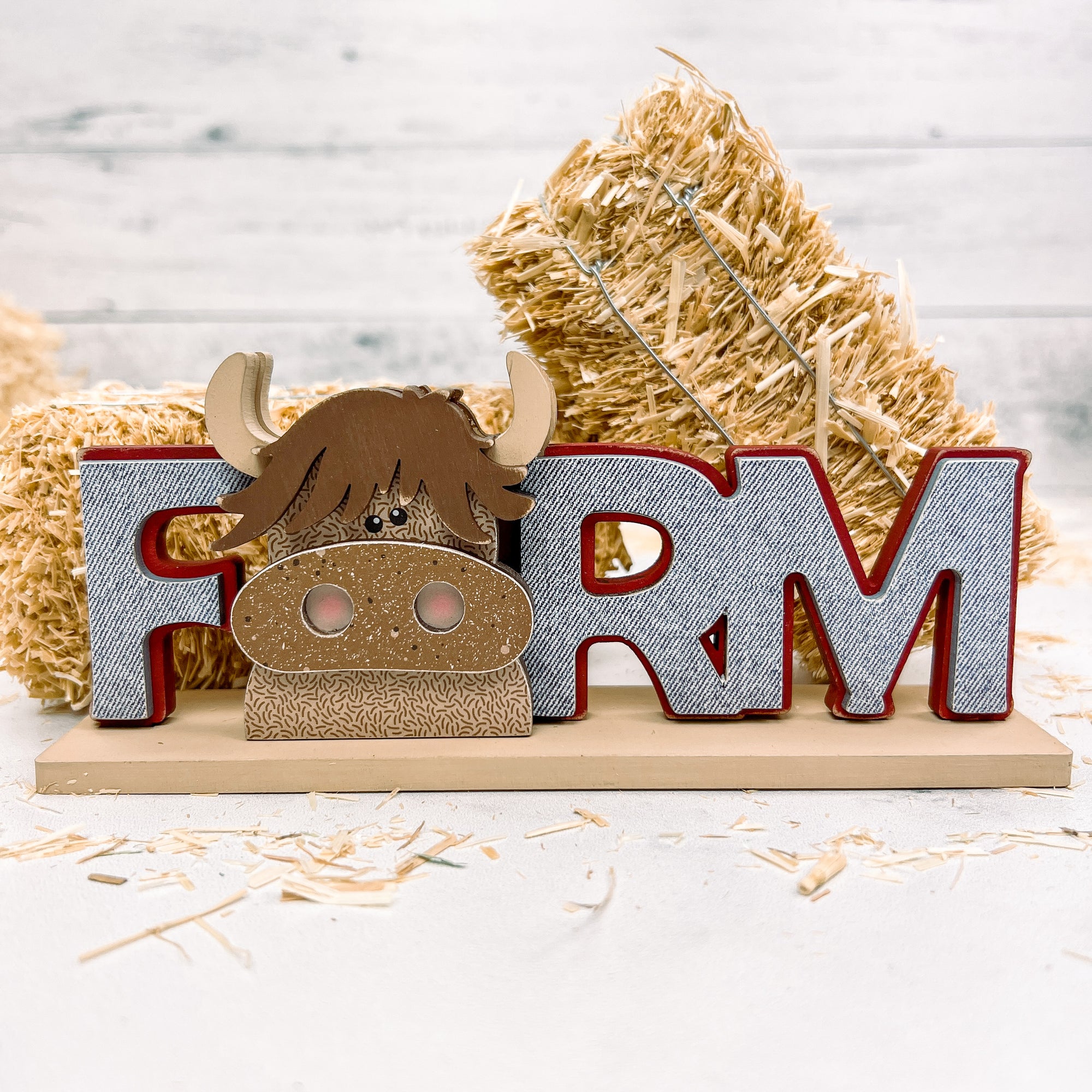 Farm word with a scruffy cow wood decor craft kit. Farm themed wood decoration for styling tiered trays, mantles, and shelves.