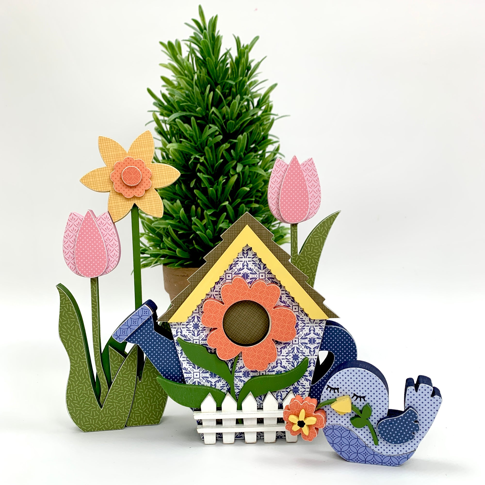Wood watering can shaped like a birdhouse, with bluebird, tulips, and daffodils. Sping wood decor craft kit. 