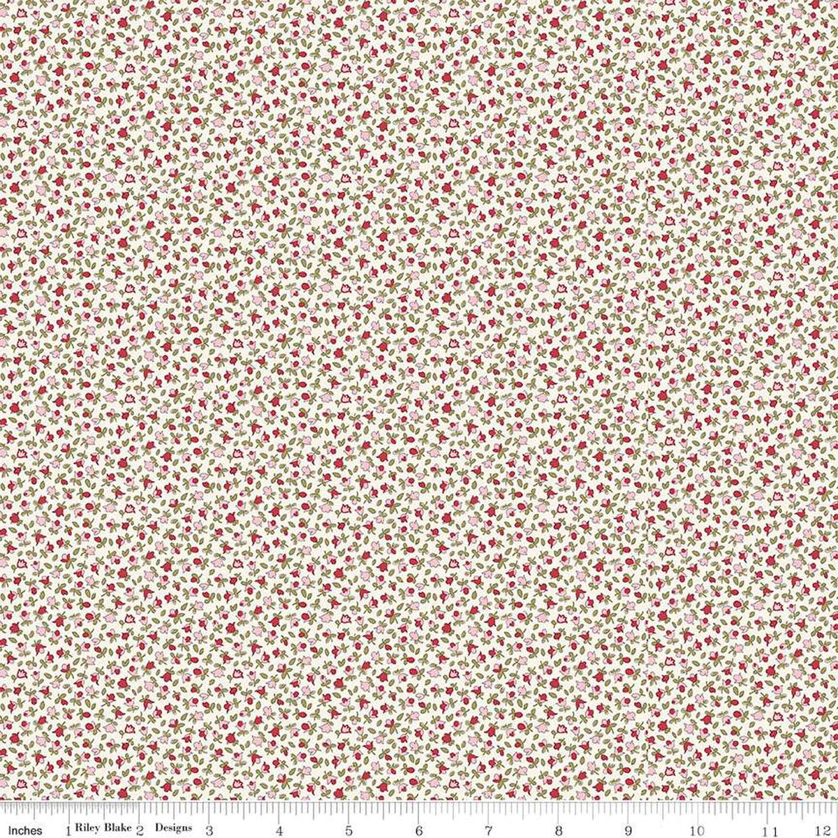 Floral fabric pattern with small red and pink flowers on a white background