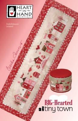 Valentine's Themed cross stitched village of red, pink and white houses with a love motif