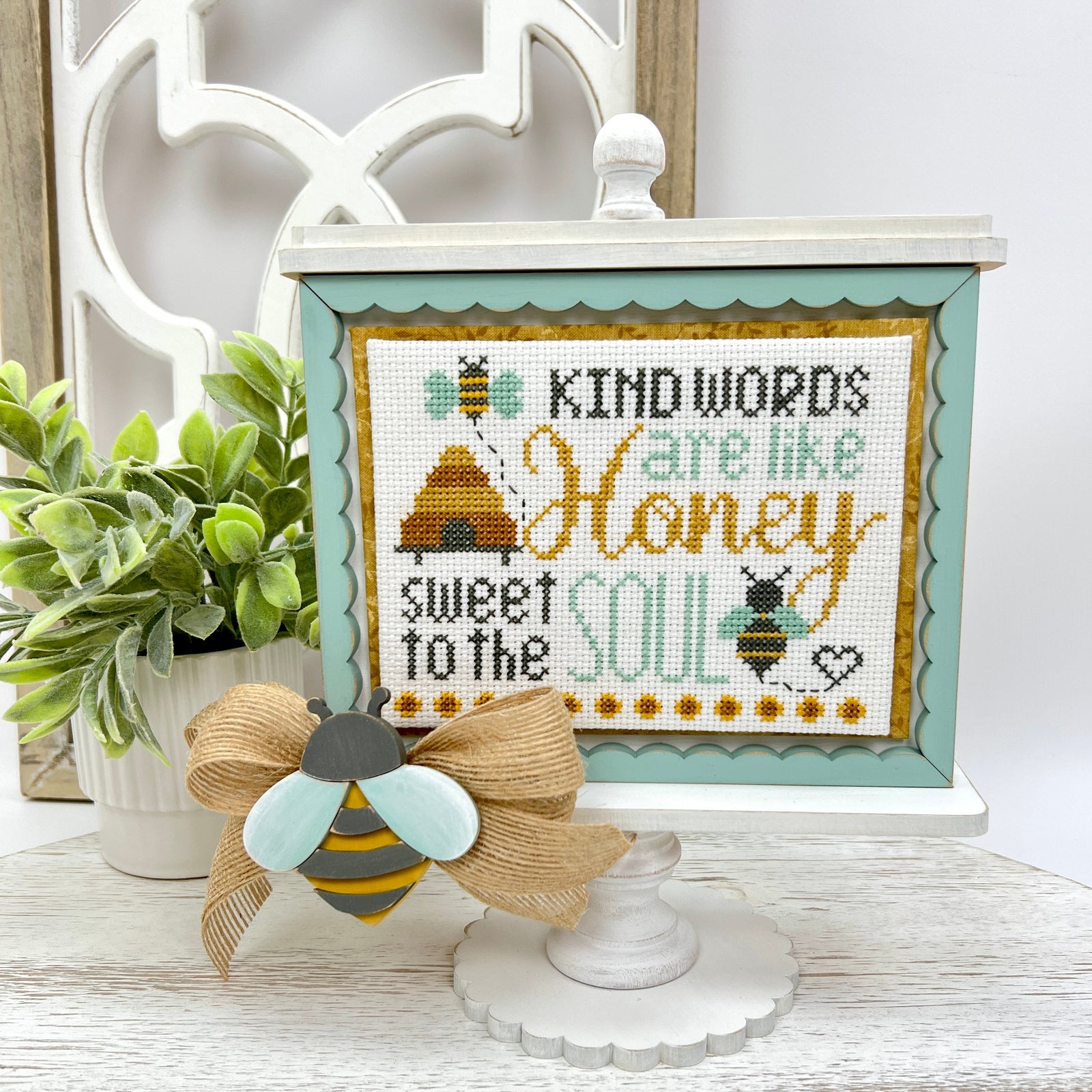 Primrose Cottages Bee cross stitch on wood pedestal frame