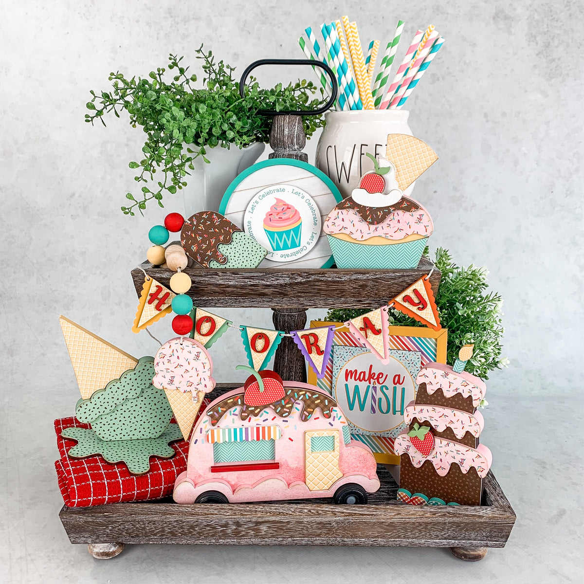 Celebrate and birthday tiered tray. Melted ice cream cone and cupcake for styling birthday and ice cream themed tiered trays. Ice cream cone and cupcake wood decor. Handmade wood decor crafts. Cupcake with a cherry on top. Mint chip flavored ice cream cone. Birthday decorations. Ice cream themed decorations. 
