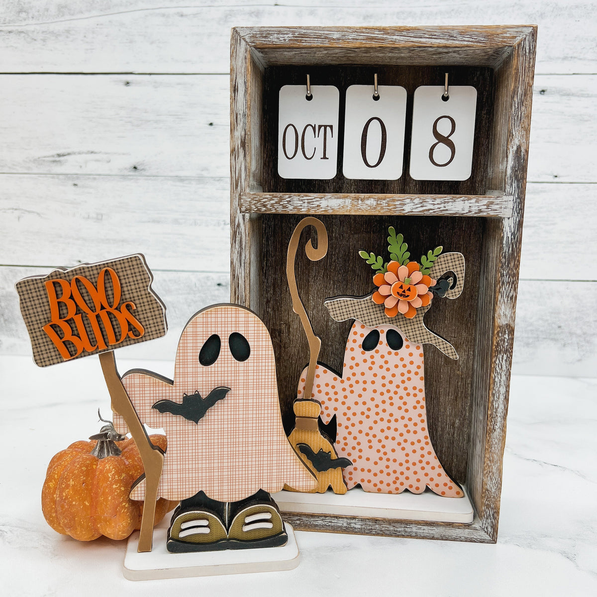 Cute ghosts displayed in a changing calendar box. DIY wood craft kit.