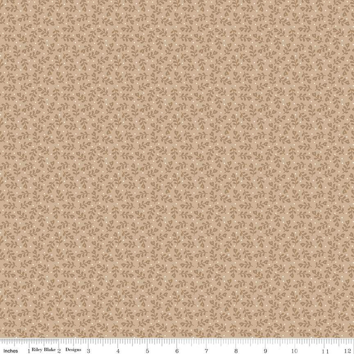 Beige fabric with subtle mistletoe  pattern and white dots