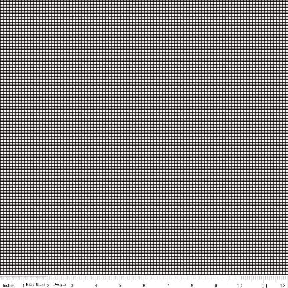 Black and white checkered fabric pattern with a measurement scale at the bottom.