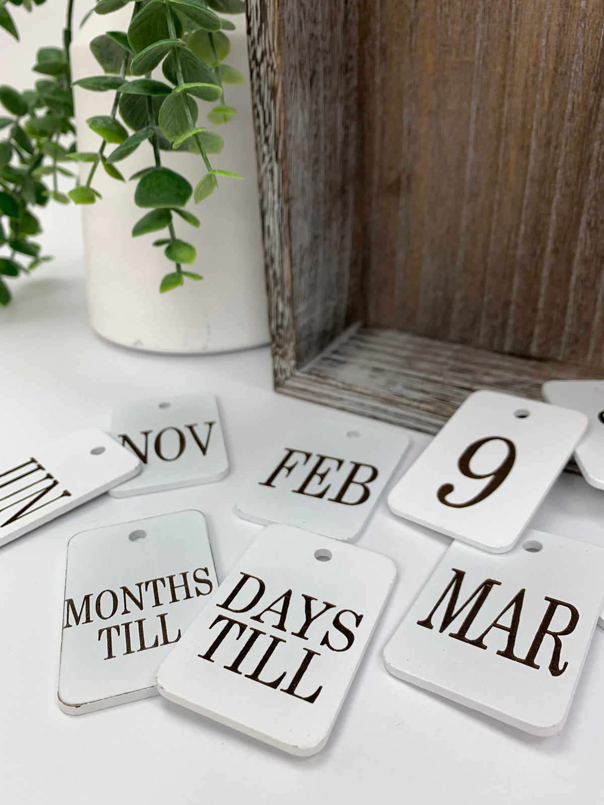 Month and number tiles for changing seasonal calendar box