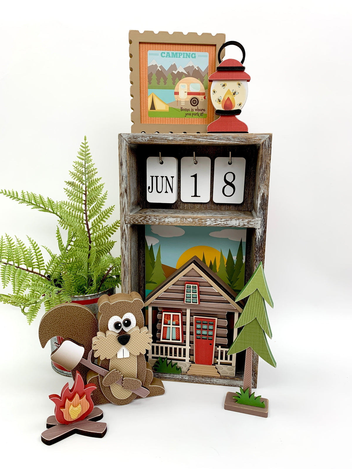 Outdoor camping wood decor craft kits with a squirrel, cabin, campfire and pine tree