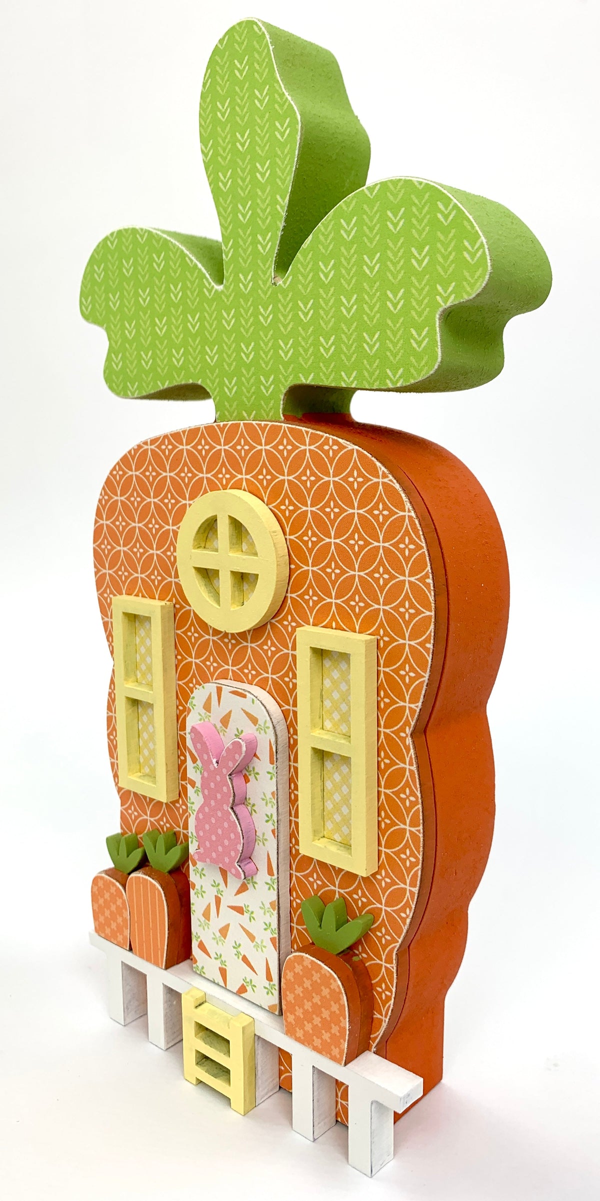 Wood carrot house Easter decoration with windows, carrots, and porch