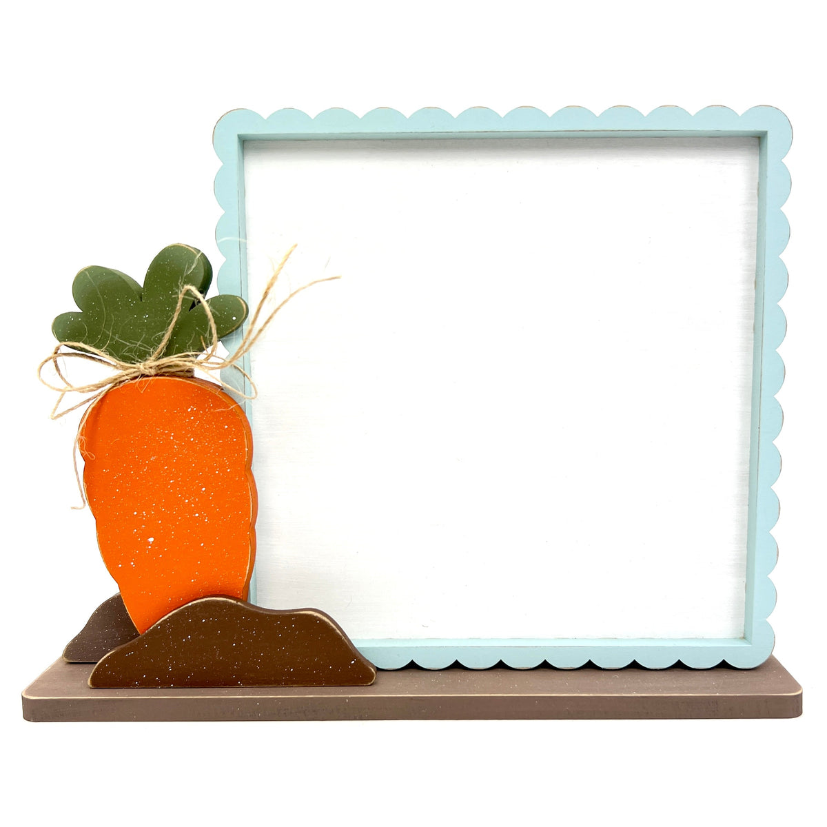 Wood cross stitch display backer with a sprouting carrot