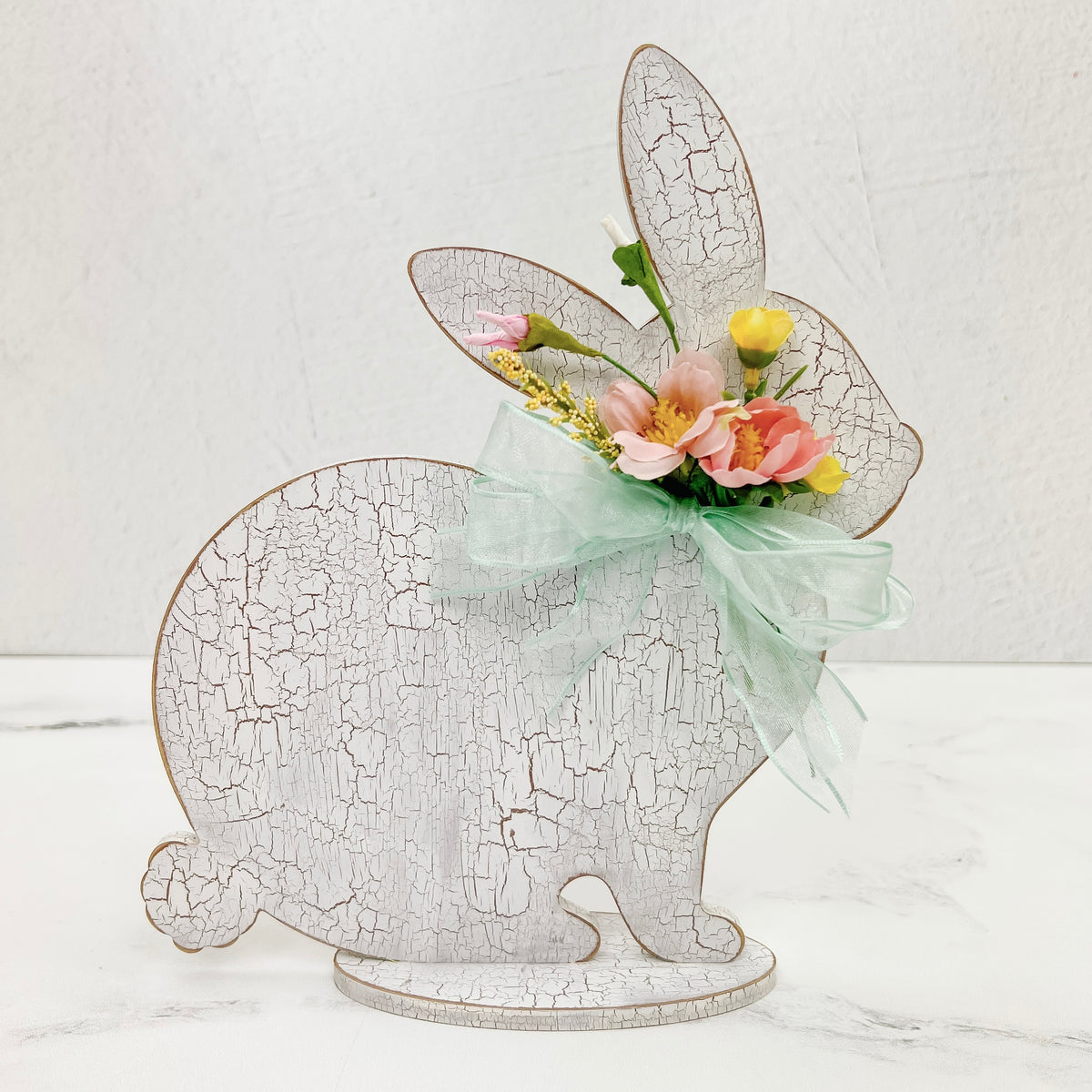 Sitting chunky bunny crackle painted wood decor with spring florals
