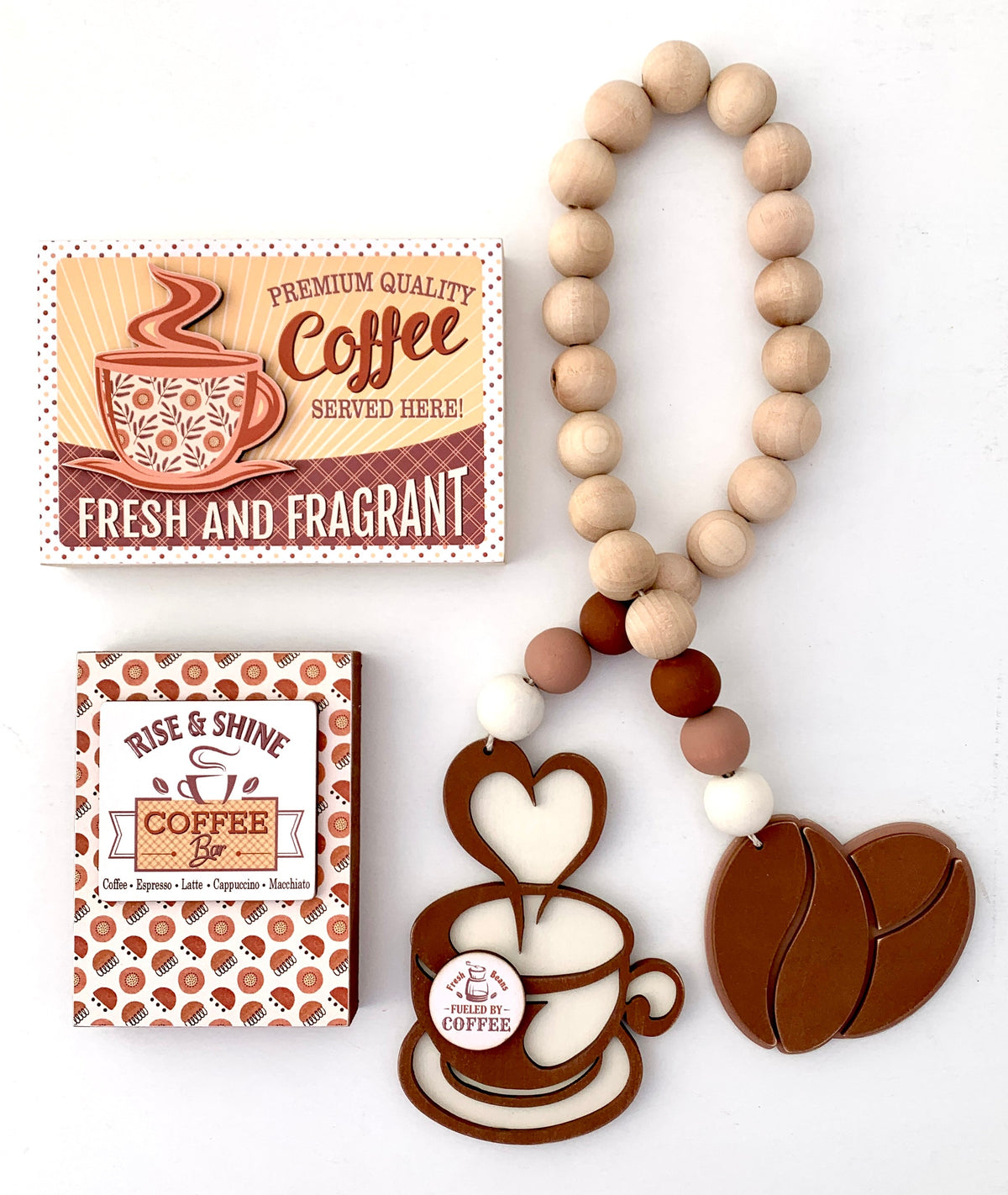 Coffee themed wood beaded garland with coffee beans and coffee cup. Two wood coffee signs for decorating trays, coffee bars, and coffee themed tiered trays. 