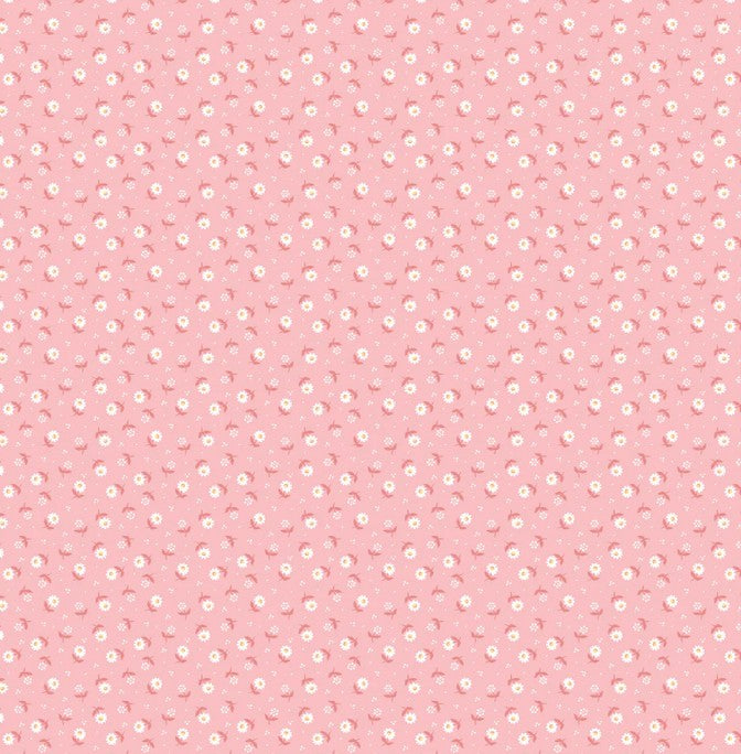 Dainty daisies and dots dancing over a  background of pink fabric