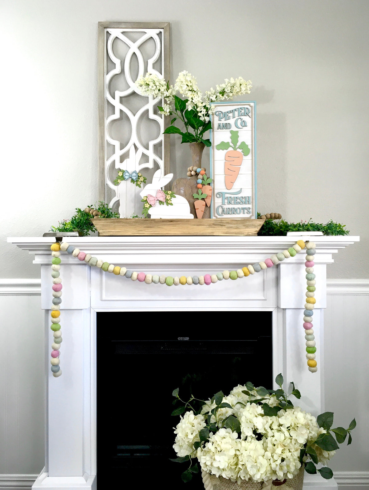 Easter fireplace styling.  Easter decorated mantle. Carrot Easter shiplap sign decoation for home decorating. Easter wood decorations. Easter sign for mantle, fireplace, countertop or shelf.