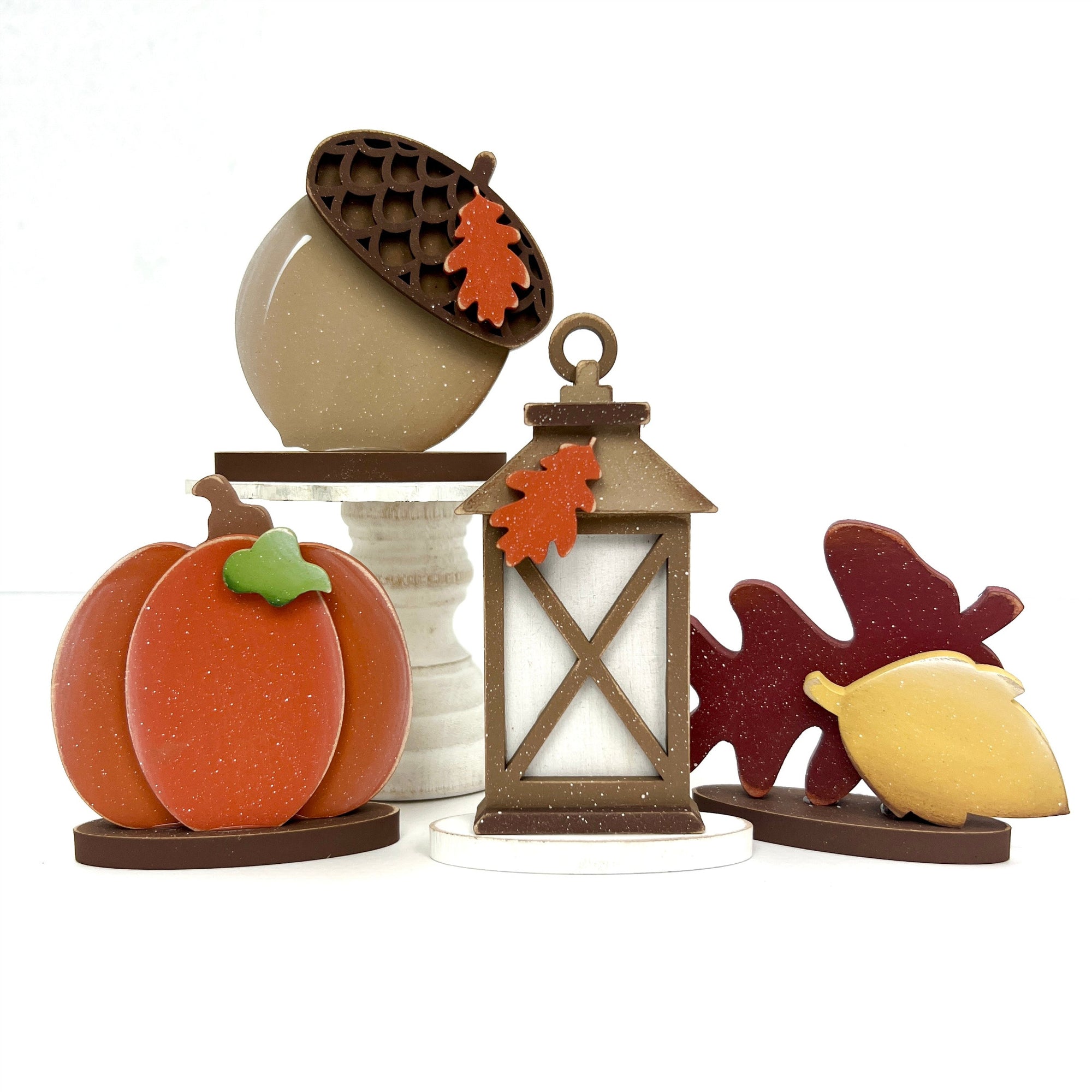 Fall wood decor shapes for crafting; acorn, pumpkin, lantern, and leaves