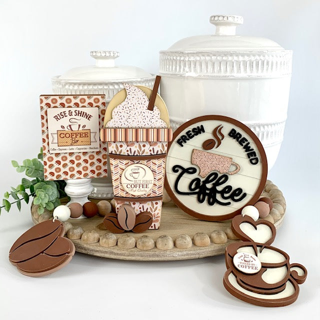 Coffee themed wood beaded garland with coffee beans and coffee cup. Two wood coffee signs for decorating trays, coffee bars, and coffee themed tiered trays. 