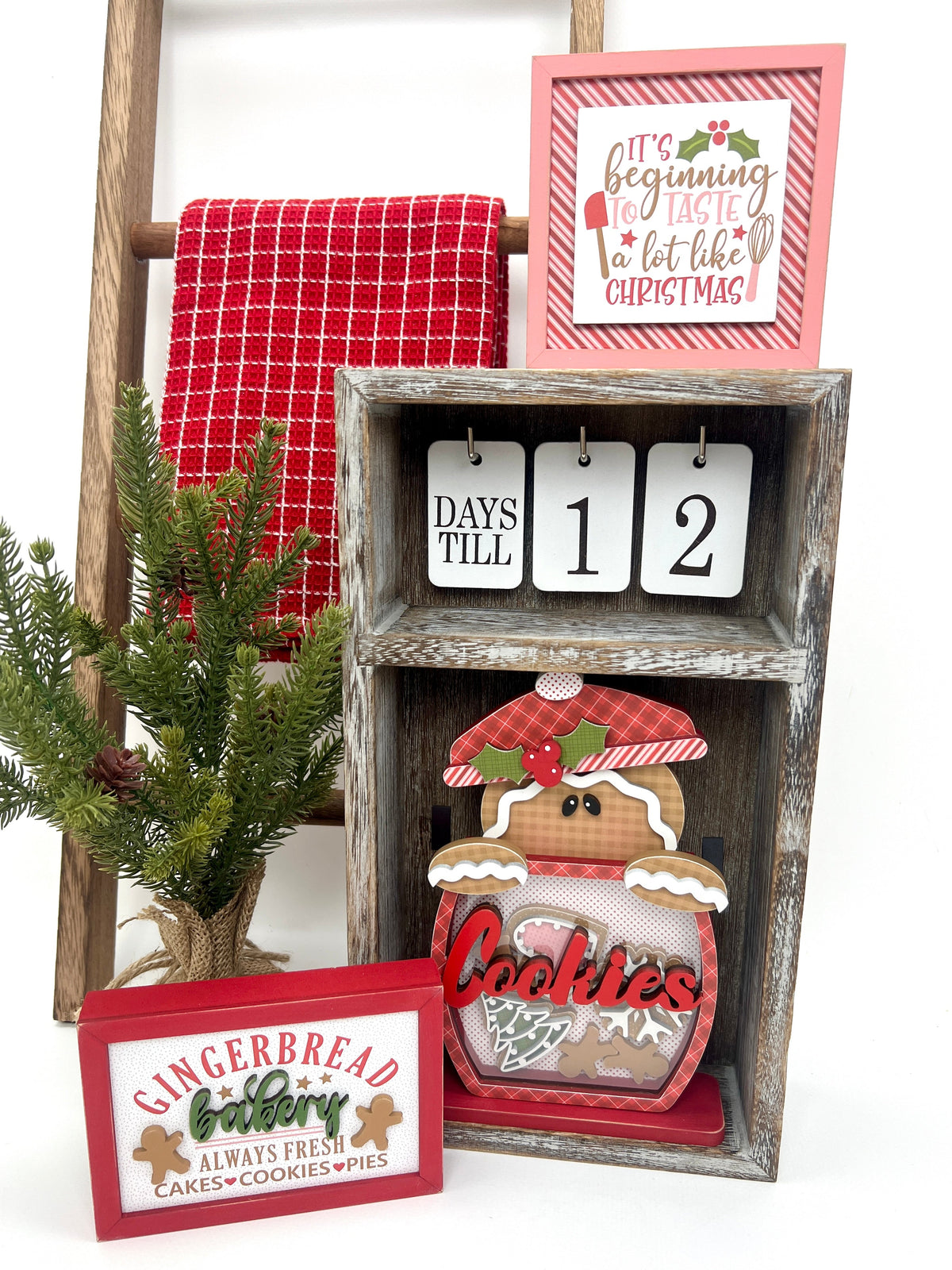 Gingerbread christmas signs displayed in a seasonal calendar countdown to Christmas box
