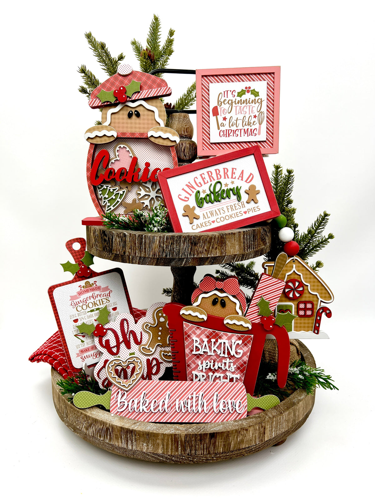 Christmas Gingerbread wood decorations on tiered tray.