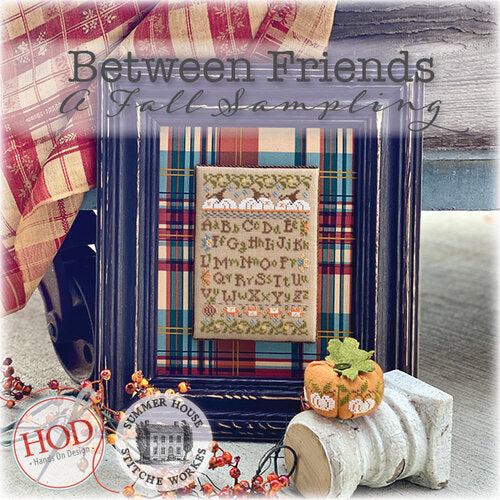 Fall Sampler cross-stitch book of patterns with fall  pumpkins and fall motifs and projects