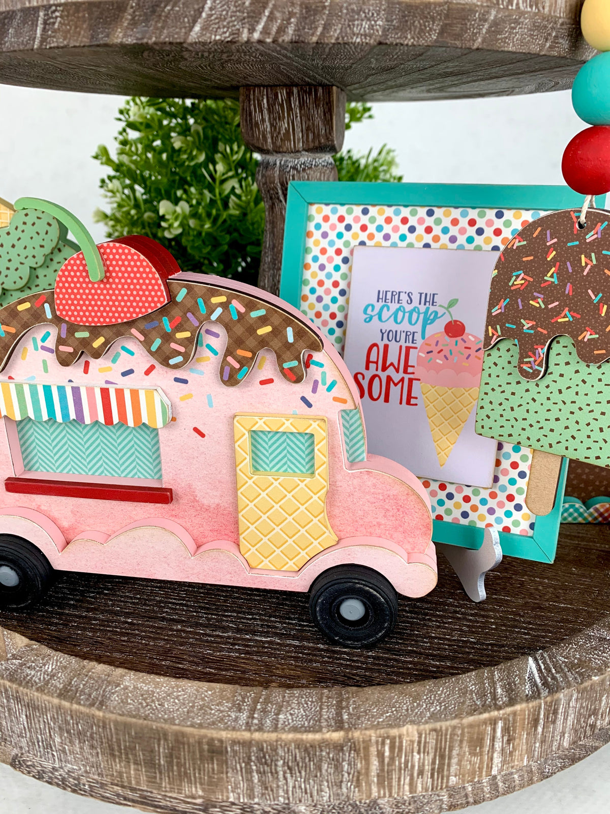 Ice Cream garland and ice cream signs for birthday and celebrate tiered tray decor.  Ice cream tiered tray decorations. Beaded hanging garland with ice cream cones. Handmade wood decor crafts. Handmade tiered tray decor. Seasonal decorations. Here&#39;s the scoop ice cream sign.