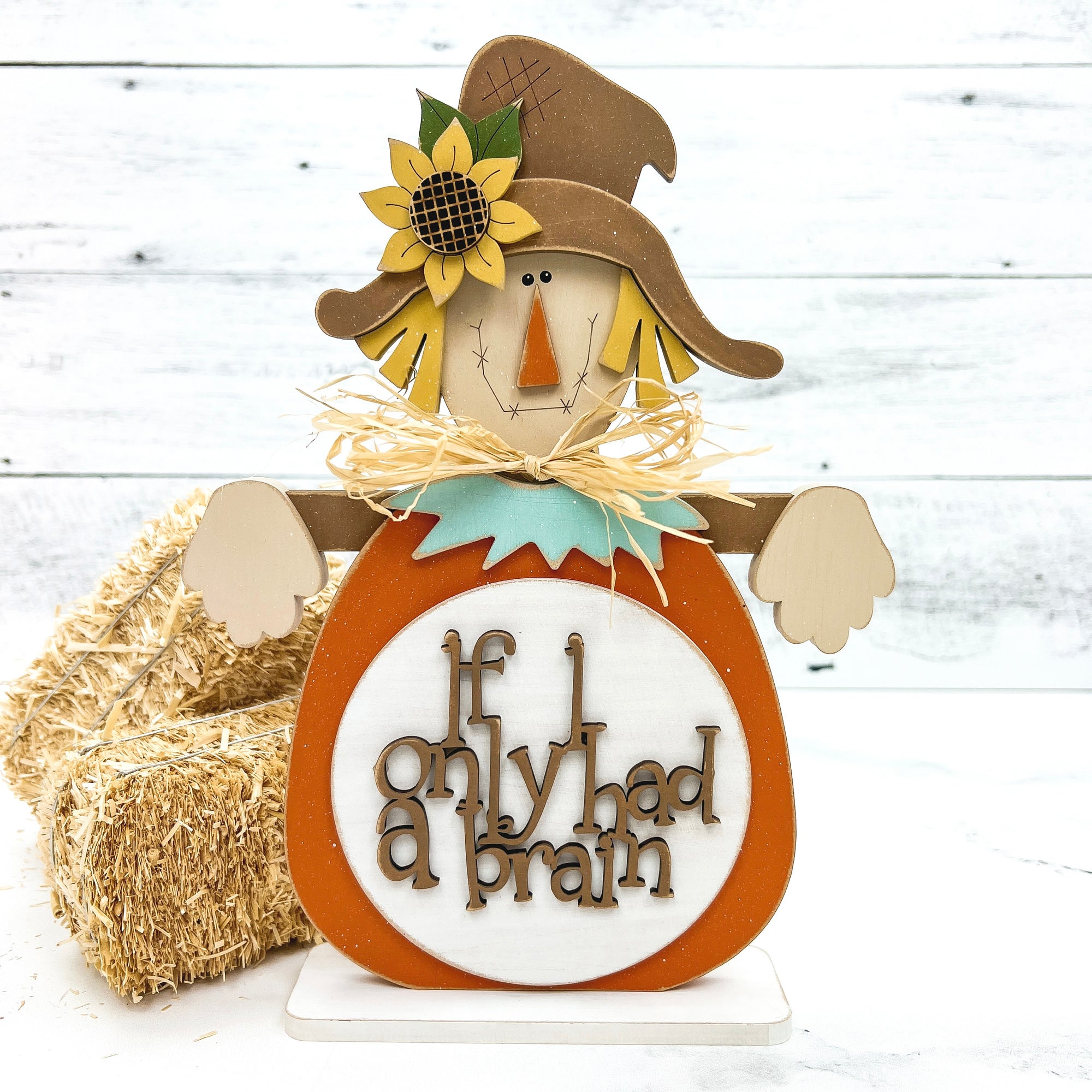 Wood fall scarecrow with pumpkin and straw hat with a phrase that says, If I only Had A Brain. Fall wood decorations and DIY wood craft kit.