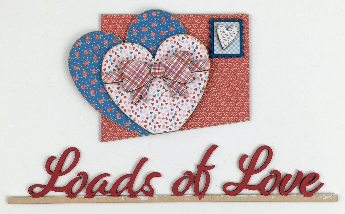 Wood farmhouse truck with interchangeable bed inserts.  Pick up truck with hearts and love letter in the bed of the truck. Valentine wood decor crafts.  Handmade wood crafts