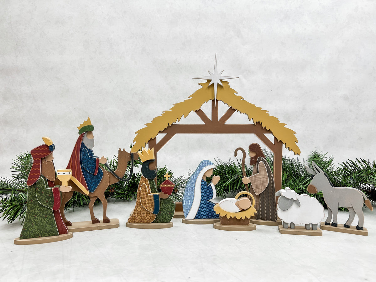 Nativity wood decor set with Mary, Joseph, baby Jesus, stable animals, and the 3 wisemen