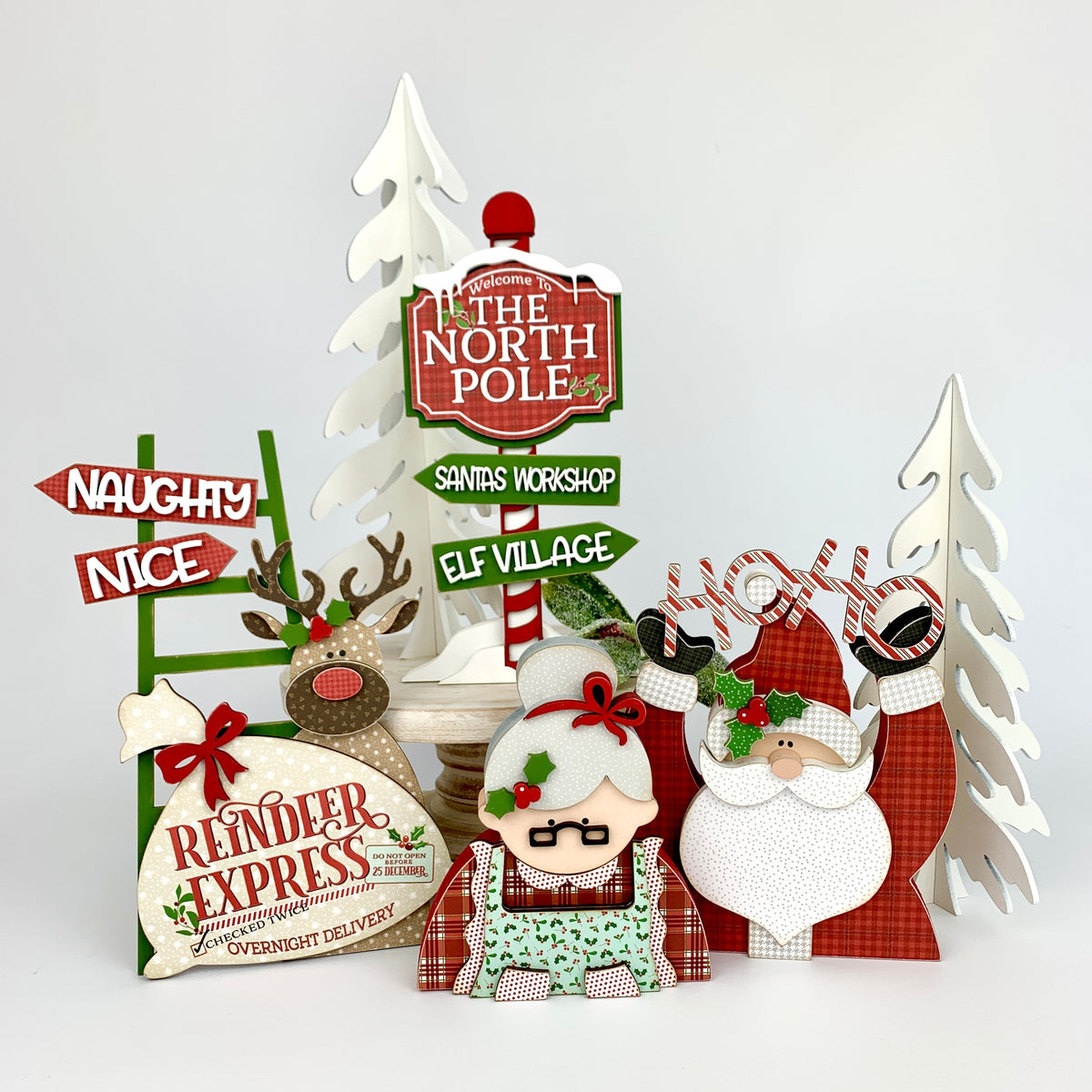 North pole, santa&#39;s village, Mr and Mrs Claus, and reindeer express wood decor craft kits for styling tiered and decorative trays