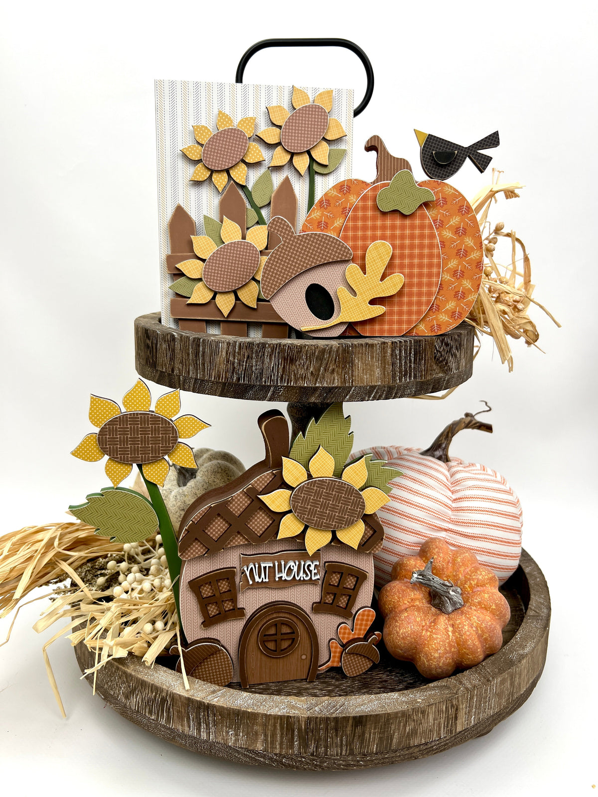 Fall tiered tray wood decorations with yellow sunflowers and an acorn nut house with windows and a door