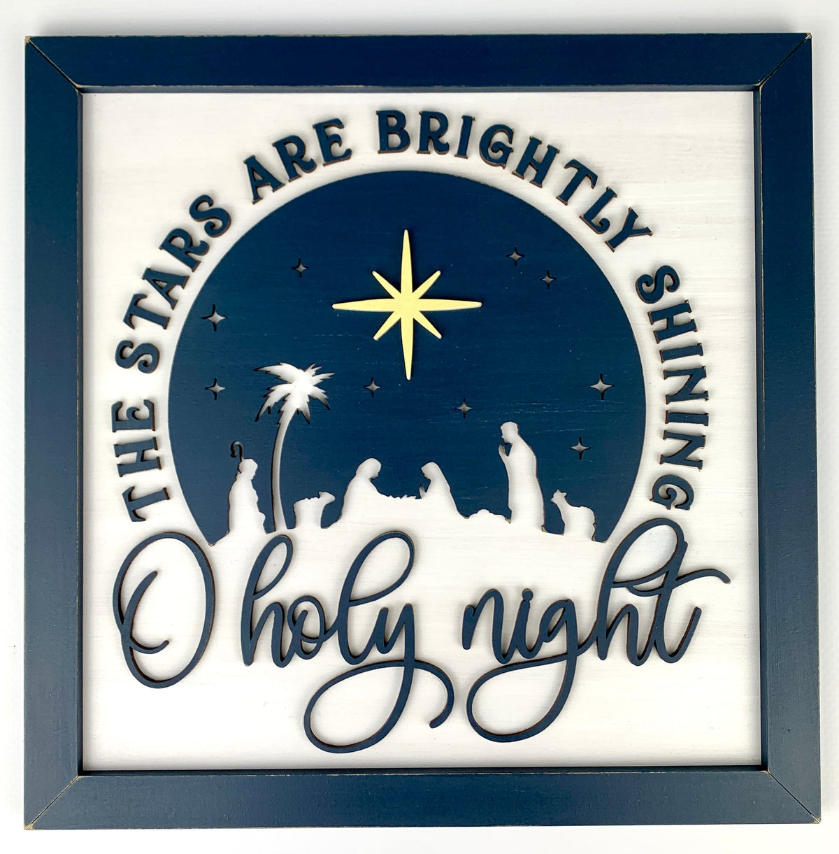 10 x 10 wood decor sign with a nativity scene and the title O Holy Night.  Wood Christmas sign with baby Jesus.  The stars are signing brightly sign.