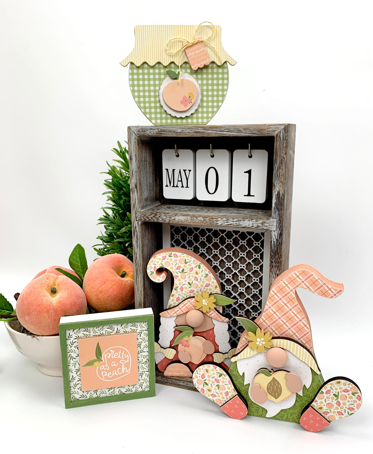 wood Peach gnomes, wood jam jar, and pretty as a peach sign in a changing date calendar box.