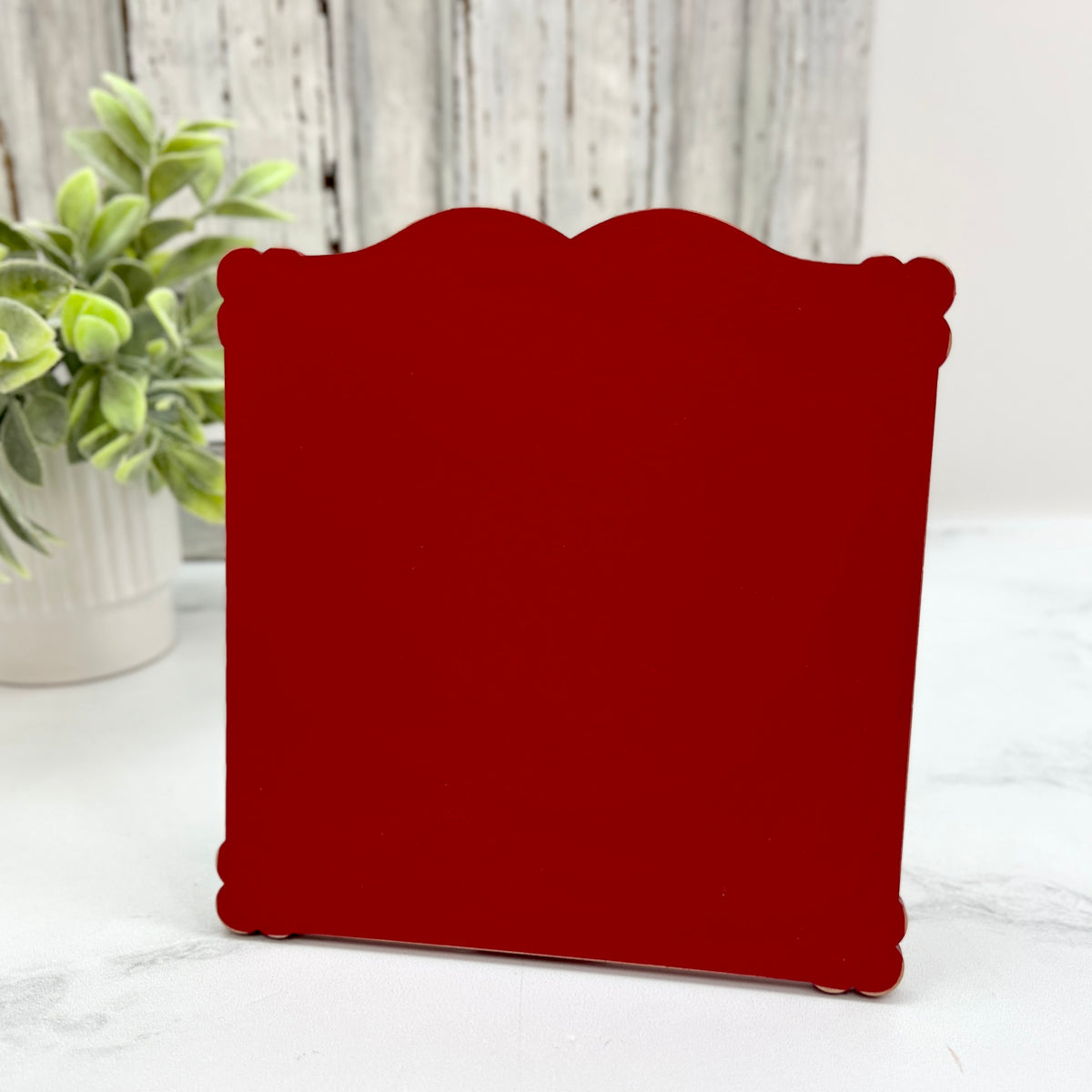 Medium Petal Edge Square cross stitch display pre-painted in red with soft scalloped edges for finished cross stitch pieces up to 6.5 by 6.5 inches.