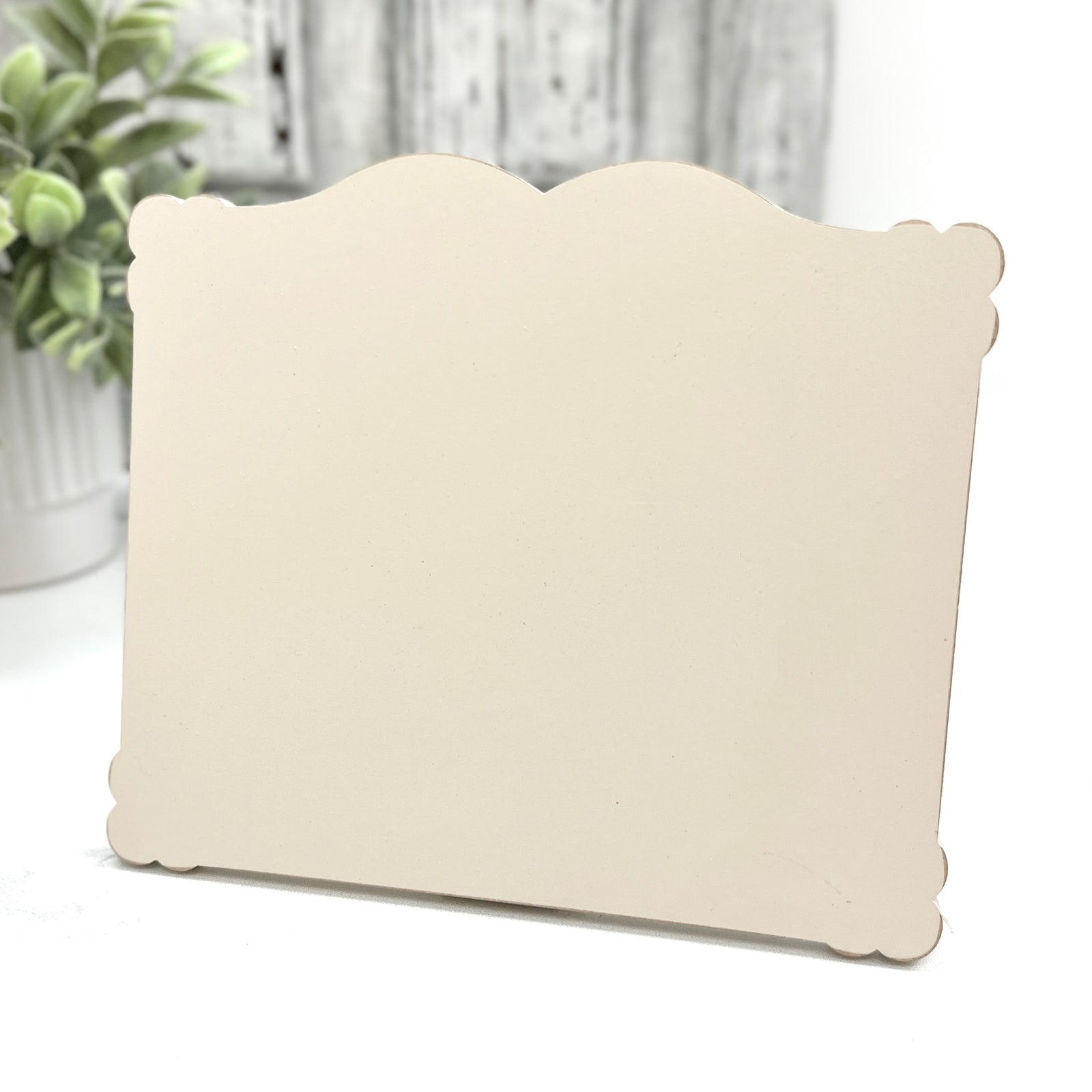 Medium Petal Edge Rectangle cross stitch display pre-painted in cream with lightly distressed scalloped edges for finished cross stitch pieces up to 6.25 by 7.75 inches.