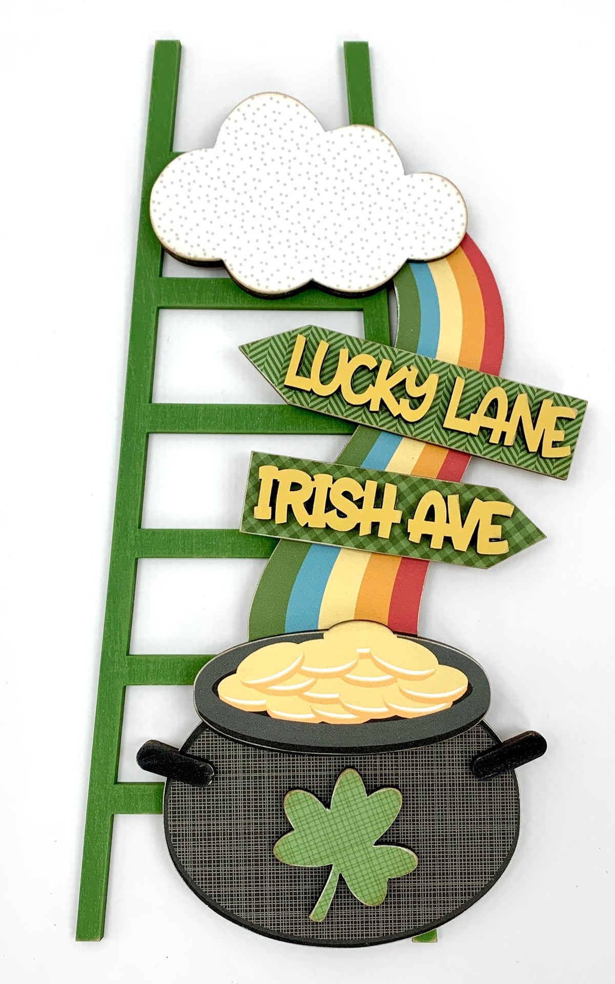 Wood decor ladder for St. Patrick&#39;s day with a Pot O&#39;Gold and rainbow.