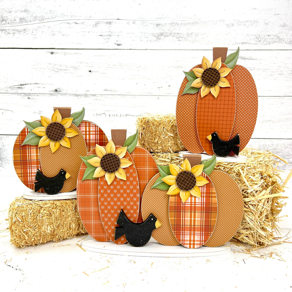 wood craft kit with orange plaid pumpkins, sunflowers, and crows.