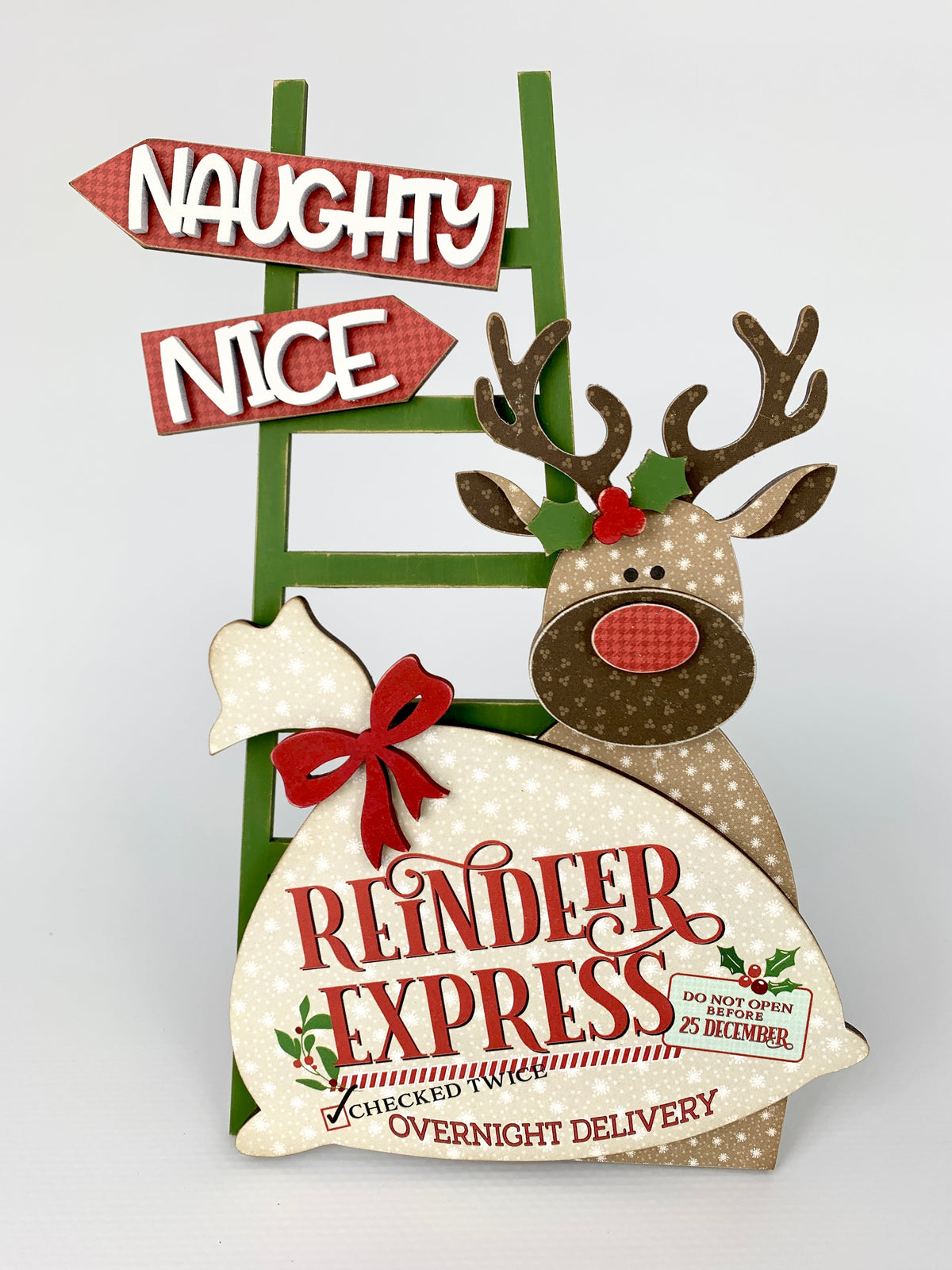 Ladder for Christmas teired tray with a reindeer holding a Santa Express mail bag.  Ladder has naughty or nice signs.  Christmas reindeer tiered tray or decorative tray wood decor craft kit