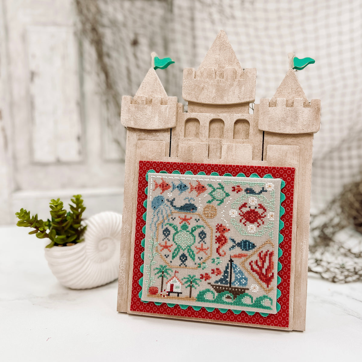 Laser cut unfinished wood sand castle cross stitch display for finishing beach and nautical cross stitch pieces