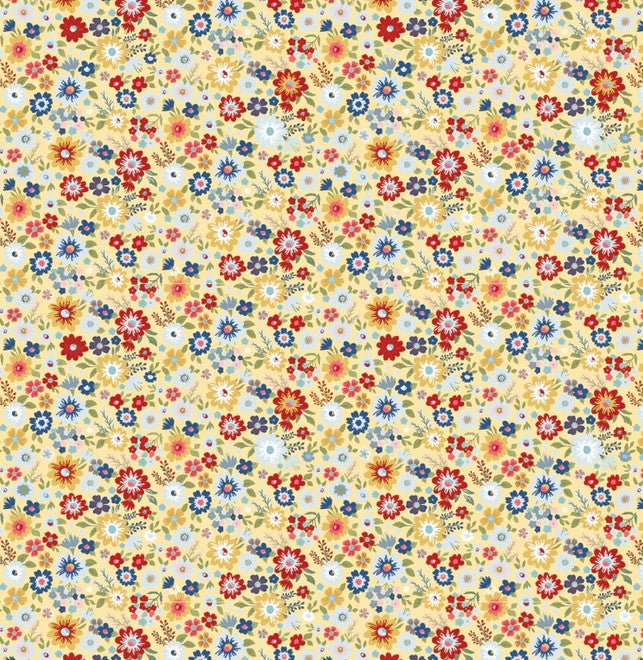 Colorful floral pattern of reds blues and yellows  on a yellow background