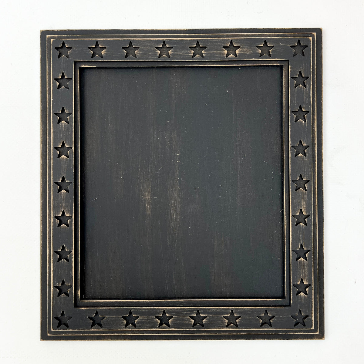 Rustic square wooden cross stitch display frame with cut-out star border and distressed farmhouse finish