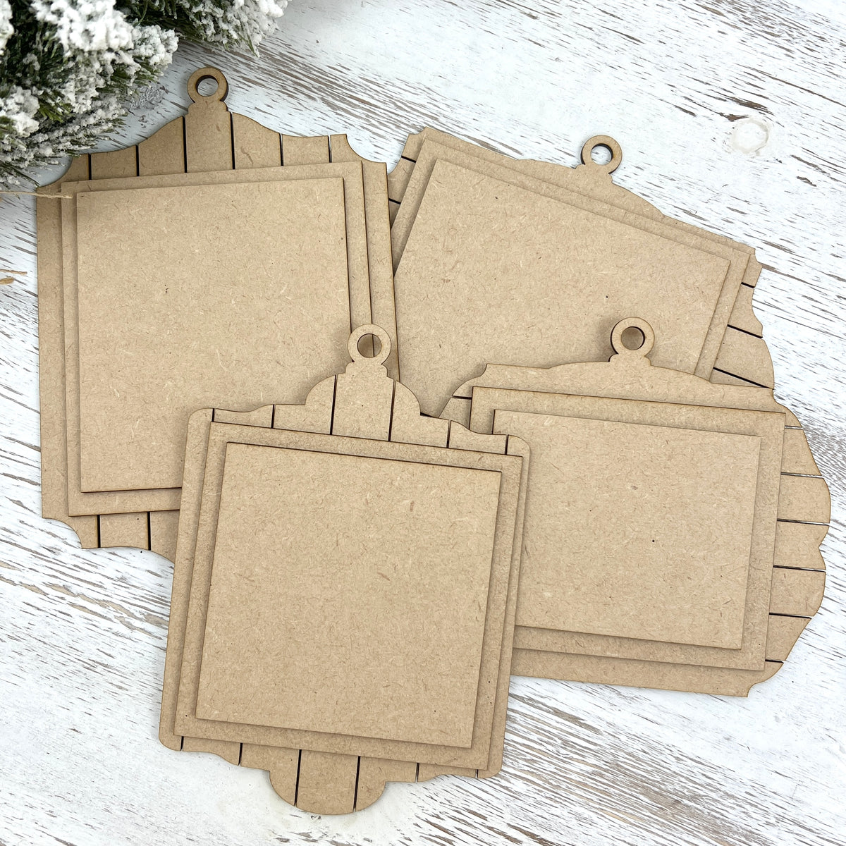 Set of four unpainted MDF shiplap cross stitch ornament displays with coordinating finishing boards