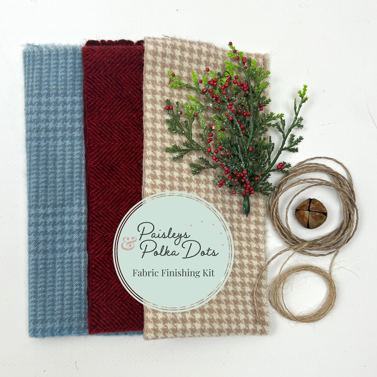 Fabric finishing kit with three fabric swatches and decorative elements on a white background