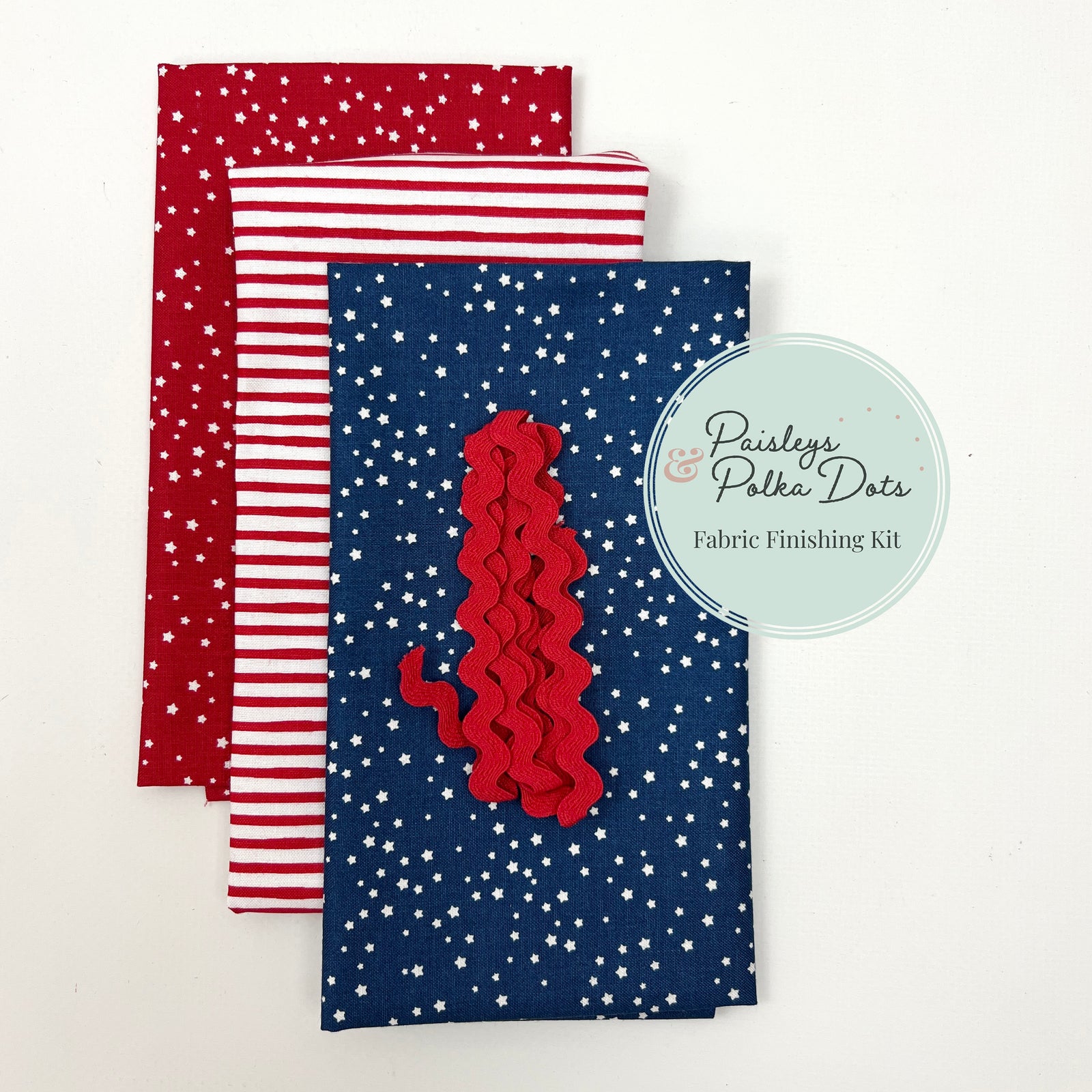 Fabric finishing kit with red fabric with white stars, red and white striped fabric, and blue fabric white stars Patriotic fabric
