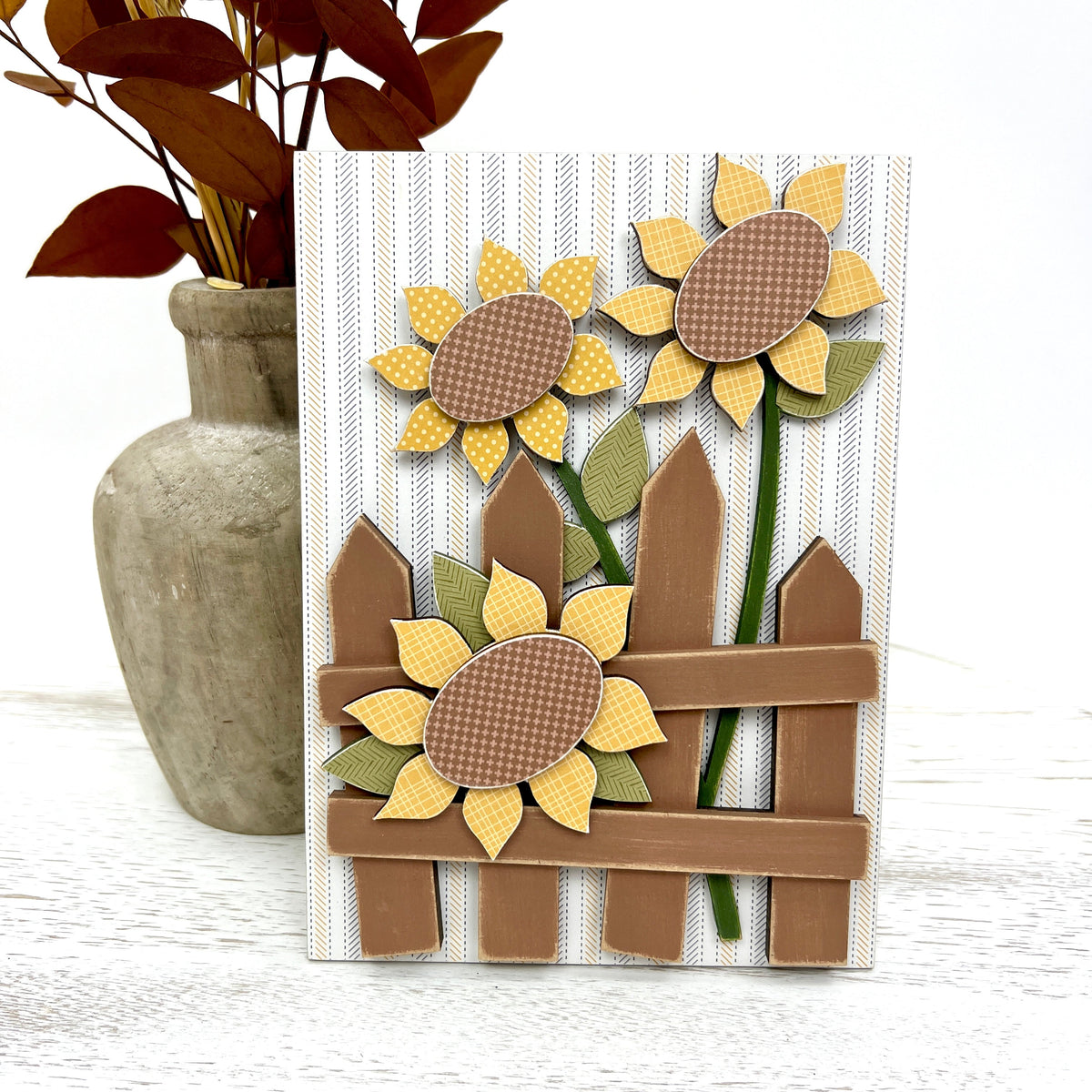 Sunflowers with a picket fence wood decoration