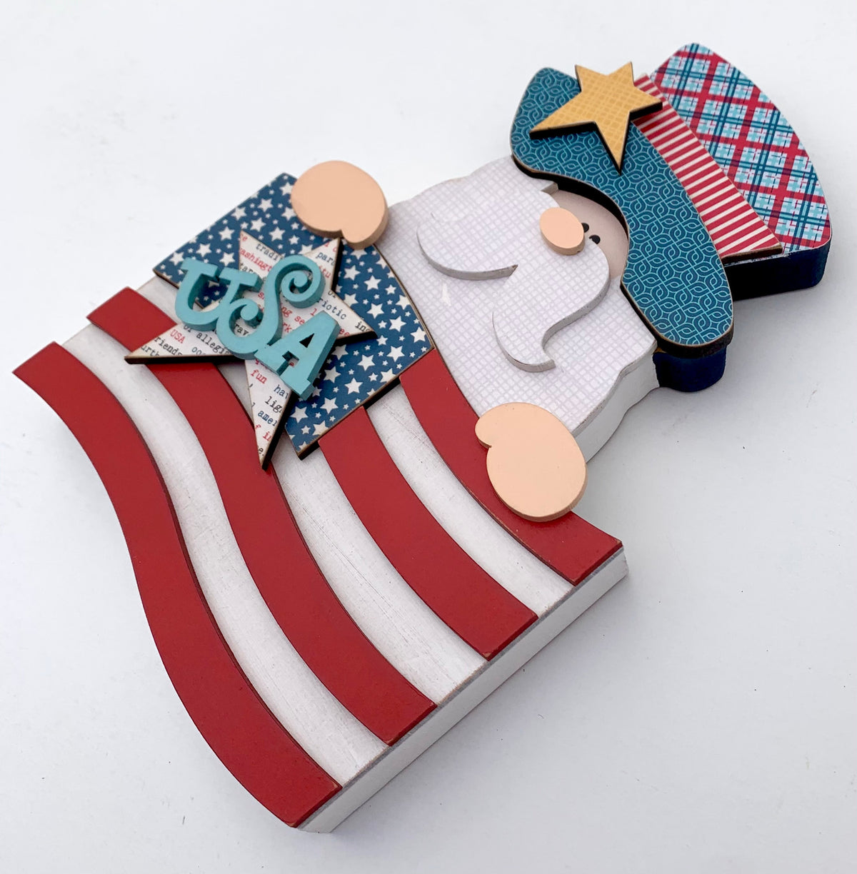 Uncle Sam holding an american flag wood decoration