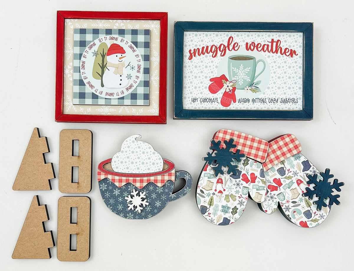 DIY wood craft kit with decorative items including framed pictures, letters, and a mug with snowman and winter-themed designs on a white background.
