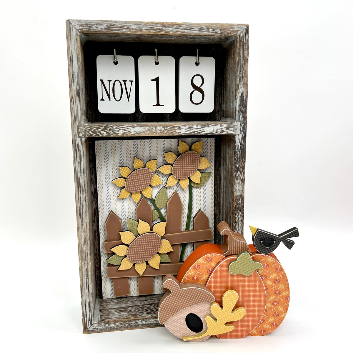 seasonal wood calendar box with fall pumpkin, acorn, and crow wood decoration