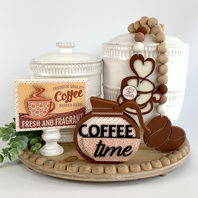 Coffee themed wood beaded garland with coffee beans and coffee cup. Two wood coffee signs for decorating trays, coffee bars, and coffee themed tiered trays. 