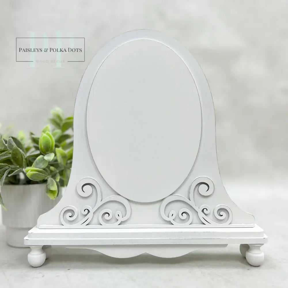 Oval shaped wood cross stitch display backer for cross stitch finishing