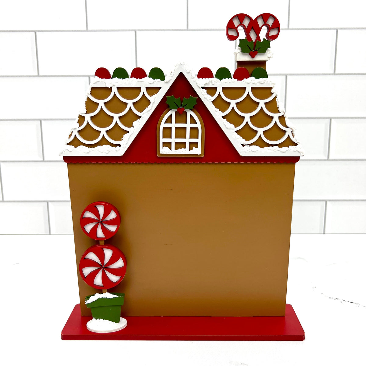 Painted wood gingerbread house for cross stitch display and finish