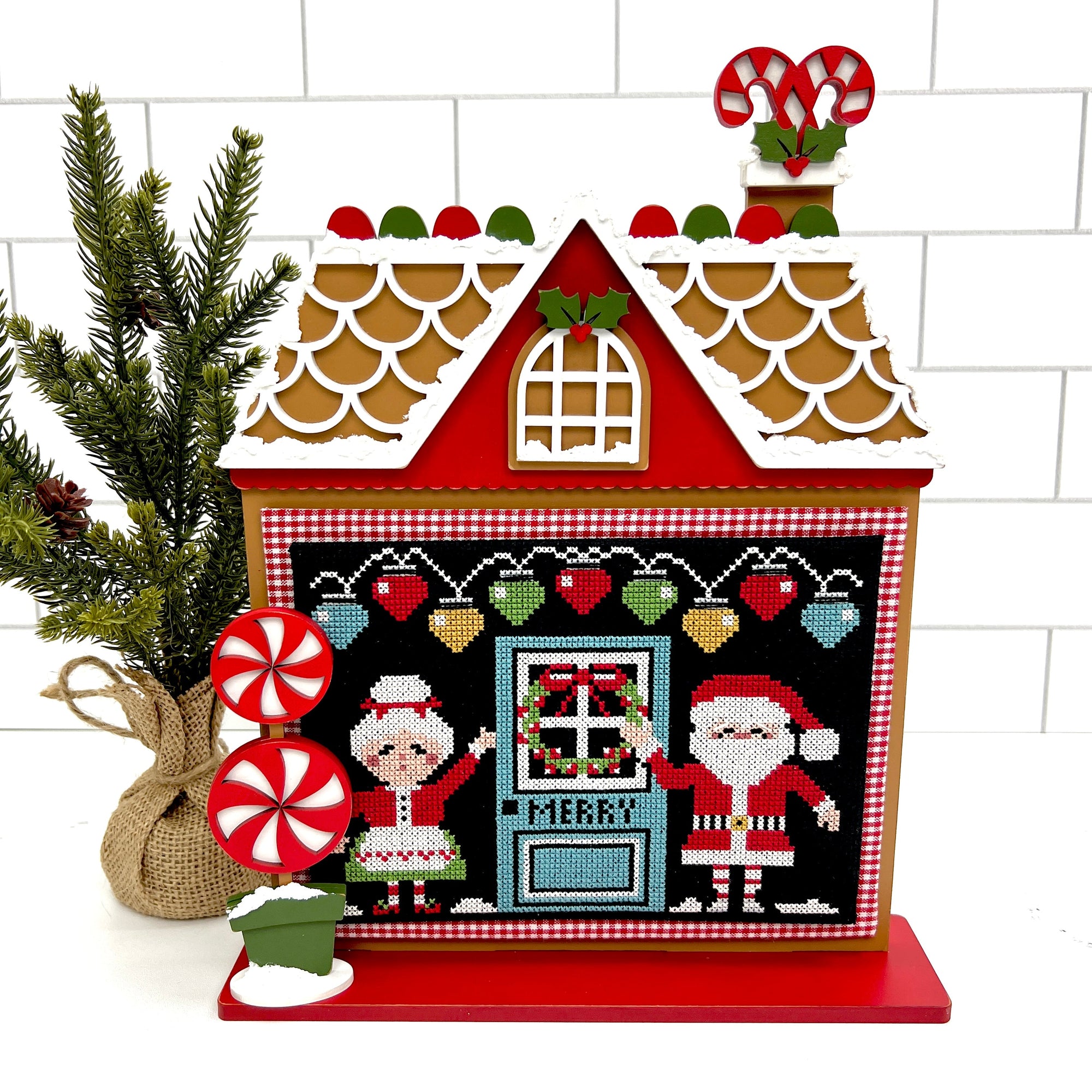 Unfinished wood gingerbread house cross stitch display backer for cross stitch finishing and needlepoint.